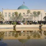 
              Iraqi security forces fire tear gas on the followers of Shiite cleric Muqtada al-Sadr inside the government Palace, Baghdad, Iraq, Monday, Aug. 29, 2022. Al-Sadr, a hugely influential Shiite cleric announced he will resign from Iraqi politics and his angry followers stormed the government palace in response. The chaos Monday sparked fears that violence could erupt in a country already beset by its worst political crisis in years. (AP Photo/Hadi Mizban)
            