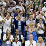 
              Tennis fans react during play between Serena Williams, of the United States, and Anett Kontaveit, of Estonia, during the second round of the U.S. Open tennis championships, Wednesday, Aug. 31, 2022, in New York. (AP Photo/Seth Wenig)
            