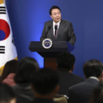 
              South Korean President Yoon Suk Yeol delivers a speech during a news conference to mark his first 100 days in office at the presidential office in Seoul, South Korea, Wednesday, Aug. 17, 2022. Yoon said Wednesday his government has no plans to pursue its own nuclear deterrent in the face of growing North Korean nuclear threats, as he urged the North to return to dialogue aimed at exchanging denuclearization steps for economic benefits. (Chung Sung-Jun/Pool Photo via AP)
            