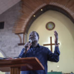 
              Presidential candidate Raila Odinga speaks to churchgoers while attending Sunday mass in St. Francis church in Nairobi, Kenya, Sunday, Aug. 14, 2022. Vote-tallying in Kenya's close presidential election isn't moving fast enough, the electoral commission chair said Friday, while parallel counting by local media dramatically slowed amid concerns about censorship or meddling. (AP Photo/Mosa'ab Elshamy)
            