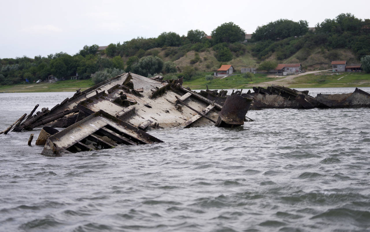The wreckage of a WWII German warship is seen in the Danube river near Prahovo, Serbia, Monday, Aug...