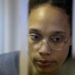 
              WNBA star and two-time Olympic gold medalist Brittney Griner stands in a cage in a courtroom prior to a hearing in Khimki just outside Moscow, Russia, Thursday, Aug. 4, 2022. Closing arguments in Brittney Griner's cannabis possession case are set for Thursday, nearly six months after the American basketball star was arrested at a Moscow airport in a case that reached the highest levels of US-Russia diplomacy. (Evgenia Novozhenina/Pool Photo via AP)
            