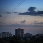 
              Russian rockets launch against Ukraine from Russia's Belgorod region are seen at dawn in Kharkiv, Ukraine, early Thursday, Aug. 18, 2022. (AP Photo/Vadim Belikov)
            