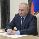 
              Russian President Vladimir Putin attends a meeting via teleconference call, in Moscow, Russia, Monday, Aug. 22, 2022. (Pavel Byrkin, Sputnik, Kremlin Pool Photo via AP)
            