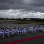 
              Navy sailors march as they prepare to receive president Ranil Wickremesinghe before arriving to deliver the policy speech of his government at the parliamentary complex in Colombo, Sri Lanka, Wednesday, Aug. 3, 2022. (AP Photo/Eranga Jayawardena)
            