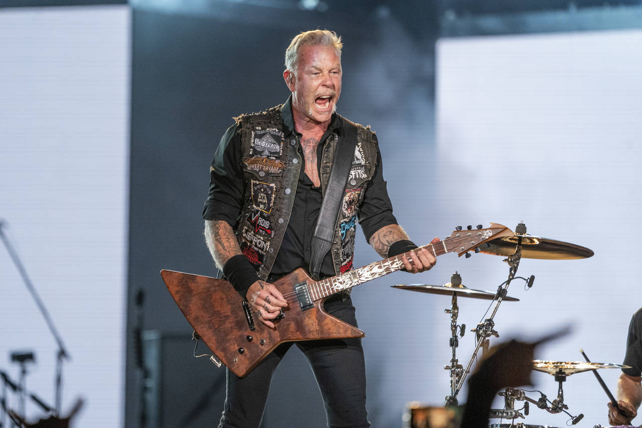 FILE - James Hetfield of Metallica performs at the Lollapalooza Music Festival in Chicago on July 2...