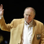 
              FILE - Len Dawson is introduced before the inaugural Pro Football Hall of Fame Fan Fest Friday, May 2, 2014, at the International Exposition Center in Cleveland. Hall of Fame quarterback Len Dawson, who helped the Kansas City Chiefs to a Super Bowl title, died Wednesday, Aug. 24, 2022. He was 87. (AP Photo/Mark Duncan, File)
            