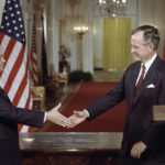 
              FILE - Soviet President Mikhail Gorbachev, left, and President George H. Bush shake hands following the signing of accords at the White House in Washington, Friday, June 1, 1990. Russian news agencies are reporting that former Soviet President Mikhail Gorbachev has died at 91. The Tass, RIA Novosti and Interfax news agencies cited the Central Clinical Hospital. (AP Photo/Ron Edmonds, file)
            