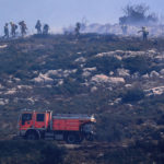 
              Firefighters work to put out a wildfire near Alcublas, eastern Spain, on Thursday, Aug. 18, 2022. The European Forest Fire Information System says 275,000 hectares (679,000 acres) have burned in wildfires so far this year in Spain. That's more than four times the country's annual average of 67,000 hectares (165,000 acres) since 2006, when records began. (AP Photo/Alberto Saiz)
            