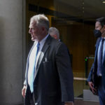 
              Elliot Peters, left, an attorney representing the PGA Tour, leaves a federal courthouse in San Jose, Calif., Tuesday, Aug. 9, 2022. A federal judge has ruled that three golfers who joined Saudi-backed LIV Golf will not be able to compete in the PGA Tour's postseason. (AP Photo/Godofredo A. Vásquez)
            