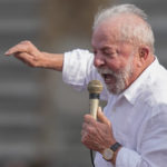 
              Brazil's former President Luiz Inacio Lula da Silva, who is running for reelection, speaks during a campaign rally outside the Volkswagen auto maker´s plant in Sao Bernardo do Campo, greater Sao Paulo area, Brazil, Tuesday, Aug. 16, 2022. Brazil's general elections are scheduled for Oct. 2, 2022. (AP Photo/Andre Penner)
            