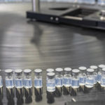 
              This August 2022 photo provided by Pfizer shows vials of the company's updated COVID-19 vaccine during production in Kalamazoo, Mich.  U.S. regulators have authorized updated COVID-19 boosters, the first to directly target today's most common omicron strain. The move on Wednesday, Aug. 13, 2022,  by the Food and Drug Administration tweaks the recipe of shots made by Pfizer and rival Moderna  that already have saved millions of lives.  (Pfizer via AP)
            