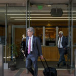 
              Robert Walters, left, an attorney representing three LIV Golf players, leaves a federal courthouse in San Jose, Calif., Tuesday, Aug. 9, 2022. A federal judge has ruled that three golfers who joined Saudi-backed LIV Golf will not be able to compete in the PGA Tour's postseason. (AP Photo/Godofredo A. Vásquez)
            