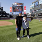 
              Musician Timmy Trumpet takes a photo with New York Mets' Edwin Diaz, left, before a baseball game against the Los Angeles Dodgers on Tuesday, Aug. 30, 2022, in New York. (AP Photo/Adam Hunger)
            