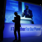 
              FILE - President Joe Biden walks off after speaking during an event about the "Global Methane Pledge" at the COP26 U.N. Climate Summit, Nov. 2, 2021, in Glasgow, Scotland, as John Kerry, United States Special Presidential Envoy for Climate takes the podium, shown on the screen. The U.S. has renewed legitimacy on global climate issues and will be able to inspire other nations in their own emissions-reducing efforts, experts said, after the Democrats pushed their big economic bill through the Senate on Sunday, Aug. 7. (AP Photo/Evan Vucci, File)
            