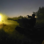 
              Ukrainian servicemen fire to Russian positions from anti-aircraft gun in Kharkiv region, Ukraine, early Wednesday, Aug. 24, 2022. (AP Photo/Andrii Marienko)
            