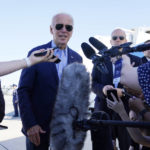President Joe Biden speaks to the media before boarding Air Force One for a trip to Kentucky to view flood damage, Monday, Aug. 8, 2022, in Dover Air Force Base, Del. (AP Photo/Evan Vucci)
