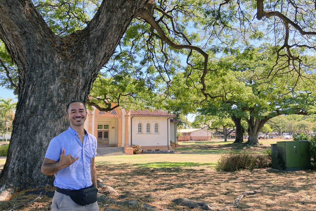 Sautia Tanoa poses for a photo while visiting his former high school in Honolulu on Friday, July 29...