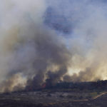 
              A forest burns during a wildfire near Altura, eastern Spain, on Friday, Aug. 19, 2022. Up to early August, 43 large wildfires — those affecting at least 500 hectares (1,235 acres) — were recorded in the Mediterranean country by the Ministry for Ecological transition, while the average in previous years was 11. The European Forest Fire Information System estimates a burned surface of 284,764 hectares (704,000 acres) in Spain this year. That's four times higher than the average since records began in 2006. (AP Photo/Alberto Saiz)
            