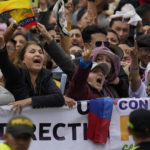 
              Supporters of new President Gustavo Petro chants slogans prior to his swearing-in ceremony at the Bolivar square in Bogota, Colombia, Sunday, Aug. 7, 2022.(AP Photo/Fernando Vergara)
            
