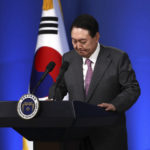 
              South Korean President Yoon Suk Yeol pauses as he delivers a speech during a news conference to mark his first 100 days in office at the presidential office in Seoul, South Korea, Wednesday, Aug. 17, 2022. Yoon said Wednesday his government has no plans to pursue its own nuclear deterrent in the face of growing North Korean nuclear threats, as he urged the North to return to dialogue aimed at exchanging denuclearization steps for economic benefits. (Chung Sung-Jun/Pool Photo via AP)
            