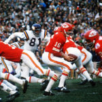 
              FILE - Kansas City Chiefs quarterback Len Dawson (16) turns around to hand the ball off to running back Mike Garrett (21) during the Super Bowl IV football game in New Orleans., Jan. 11, 1970. Hall of Fame quarterback Len Dawson, who helped the Kansas City Chiefs to a Super Bowl title, died Wednesday, Aug. 24, 2022. He was 87. (AP Photo/File)
            