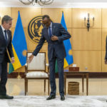 
              Secretary of State Antony Blinken, left, meets with Rwandan President Paul Kagame at the President's Office in Urugwiro Village in Kigali, Rwanda, Thursday, Aug. 11, 2022. Blinken is on a ten day trip to Cambodia, Philippines, South Africa, Congo, and Rwanda. Also pictured is Rwanda's Minister of Foreign Affairs Vincent Biruta, right. (AP Photo/Andrew Harnik, Pool)
            