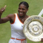 
              FILE - Serena Williams gives the thumbs up as she holds her trophy after defeating her sister Venus in the women's singles final on the Centre Court at the All England Lawn Tennis Championships at Wimbledon, Saturday July 5, 2003. Saying “the countdown has begun,” 23-time Grand Slam champion Serena Williams announced Tuesday, Aug. 9, 2022, she is ready to step away from tennis so she can turn her focus to having another child and her business interests, presaging the end of a career that transcended sports. (AP Photo/Jytte Nielsen, File)
            