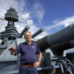 
              Tony Gregory, president and CEO of the Battleship Texas Foundation, stands on the deck as he talks about the upcoming move and repairs Tuesday, Aug. 30, 2022, in La Porte, Texas. The USS Texas, which was commissioned in 1914 and served in both World War I and World War II, is scheduled to be towed down the Houston Ship Channel Wednesday to a dry dock in Galveston where it will undergo an extensive $35 million repair. (AP Photo/David J. Phillip)
            