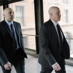 
              FILE - Former Minneapolis police officer J. Alexander Kueng, left, and his attorney Thomas Plunkett arrive for sentencing for violating George Floyd's civil rights outside the Federal Courthouse Wednesday, July 27, 2022 in St. Paul, Minn. A judge has scheduled a hearing for Monday, Aug. 15, 2022, on the status of plea negotiations in the case of the two remaining officers awaiting trial on state charges in the murder of George Floyd. Tou Thao and Kueng face a late October trial. (David Joles/Star Tribune via AP, File)
            
