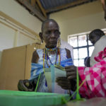 
              People line up to vote at the Oltepesi Primary School, Kajiado County in Nairobi, Kenya, Tuesday Aug. 9, 2022. Kenyans are voting to choose between opposition leader Raila Odinga and Deputy President William Ruto to succeed President Uhuru Kenyatta after a decade in power. (AP Photo/Ben Curtis)
            