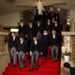 
              Japan's Prime Minister Fumio Kishida, front center, leads his cabinet ministers as they prepare for a photo session at Kishida's residence Wednesday, Aug. 10, 2022, in Tokyo. (Issei Kato/Pool Photo via AP)
            