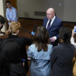 
              Russian Ambassador to the United Nations Vasily Nebenzya, center, speaks to reporters after a Security Council meeting on threats to international peace and security, Thursday, Aug. 11, 2022 at United Nations headquarters. (AP Photo/Mary Altaffer)
            
