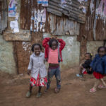
              Young children play on a street in the Kibera area of Nairobi, Kenya Thursday, Aug. 11, 2022. Kenyans are waiting for the results of a close presidential election in which the turnout was lower than usual. (AP Photo/Ben Curtis)
            