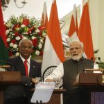 
              Maldives President Ibrahim Mohamed Solih, left and Indian Prime Minister Narendra Modi jointly launch connectivity projects in Maldives during their meeting in New Delhi, India, Tuesday, Aug.2, 2022. The Greater Male Connectivity Project, a 6.74 kilometers long bridge and causeway link funded by India will connect the nation's capital, Male, to three other islands. (AP Photo)
            