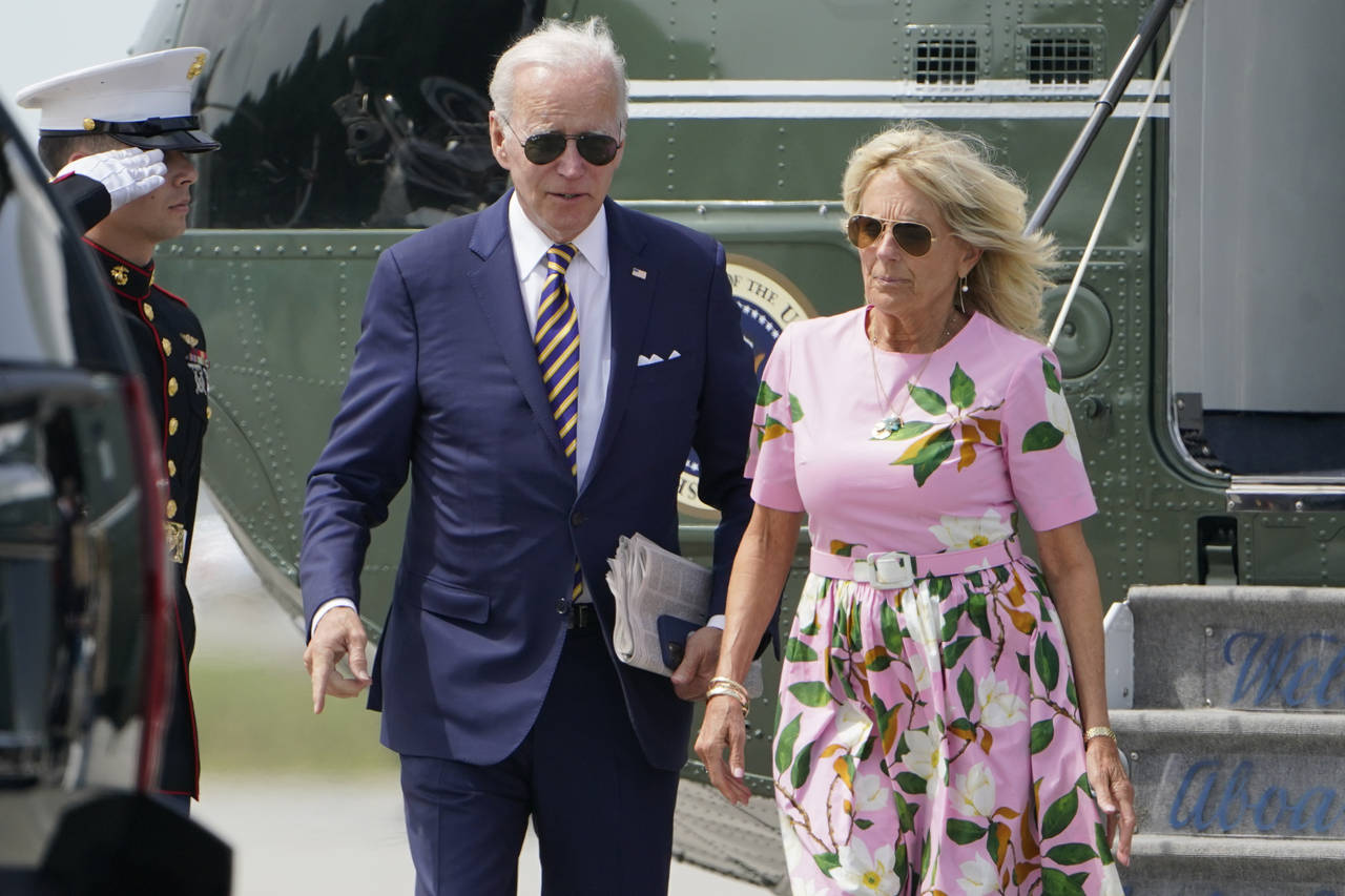 FILE - President Joe Biden and first lady Jill Biden exit Marine One at Charleston Executive Airpor...