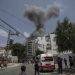 
              Smoke rises after Israeli airstrikes on residential building, in Gaza City, Saturday, Aug. 6, 2022. Israeli jets pounded militant targets in Gaza as rockets rained on southern Israel, hours after a wave of Israeli airstrikes on the coastal enclave killed at least 11 people, including a senior militant and a 5-year-old girl. The fighting began with Israel's dramatic targeted killing of a senior commander of the Palestinian Islamic Jihad continued into the morning Saturday, drawing the sides closer to an all-out war. (AP Photo/Fatima Shbair)
            
