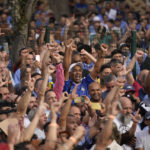 
              Supporters of Brazil's former President Luiz Inacio Lula da Silva, who is running for reelection, cheer during a campaign rally outside the Volkswagen automaker´s plant in Sao Bernardo do Campo, greater Sao Paulo area, Brazil, Tuesday, Aug. 16, 2022. Brazil's general elections are scheduled for Oct. 2, 2022. (AP Photo/Andre Penner)
            