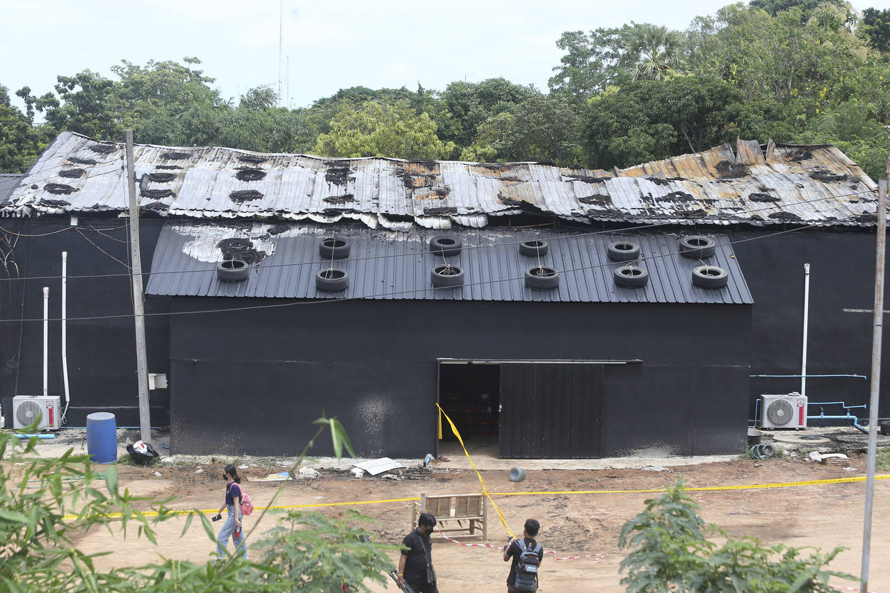 Exterior damage from a fire is seen at the Mountain B pub in the Sattahip district of Chonburi prov...