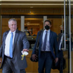 
              Elliot Peters, left, an attorney representing the PGA Tour, leaves a U.S. courthouse in San Jose, Calif., Tuesday, Aug. 9, 2022. A federal judge ruled that three golfers who joined Saudi-backed LIV Golf will not be able to compete in the PGA Tour's postseason. (AP Photo/Godofredo A. Vásquez)
            