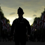 
              A police officer crosses the Mall on the eve of the funeral of Queen Elizabeth II in London, England, Sunday, Sept. 18, 2022. Queen Elizabeth II, Britain's longest-reigning monarch and a rock of stability across much of a turbulent century, died Thursday Sept. 8, 2022, after 70 years on the throne. She was 96. (AP Photo/Petr David Josek)
            