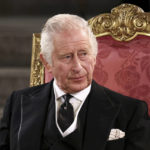 
              Britain's King Charles III sits at Westminster Hall, where both Houses of Parliament are meeting to express their condolences following the death of Queen Elizabeth II, at Westminster Hall, in London, Monday, Sept. 12, 2022. Queen Elizabeth II, Britain's longest-reigning monarch, died Thursday after 70 years on the throne. (Henry Nicholls/Pool Photo via AP)
            