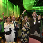 
              Supporters of the Green Party react on the exit polls during the party's election watch at the Quality Hotel Globe in Stockholm, Sweden, Sunday, Sept. 11, 2022. Sweden is holding an election that is expected to boost a populist anti- immigration party that is vowing to crack down on gang violence shaking many people's sense of security. (Henrik Montgomery/TT News Agency via AP)
            