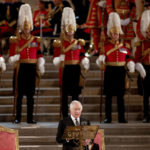 
              Britain's King Charles III speaks at Westminster Hall, where both Houses of Parliament are meeting to express their condolences following the death of Queen Elizabeth II, at Westminster Hall, in London, Monday, Sept. 12, 2022. Queen Elizabeth II, Britain's longest-reigning monarch, died Thursday after 70 years on the throne. (John Sibley/Pool Photo via AP)
            