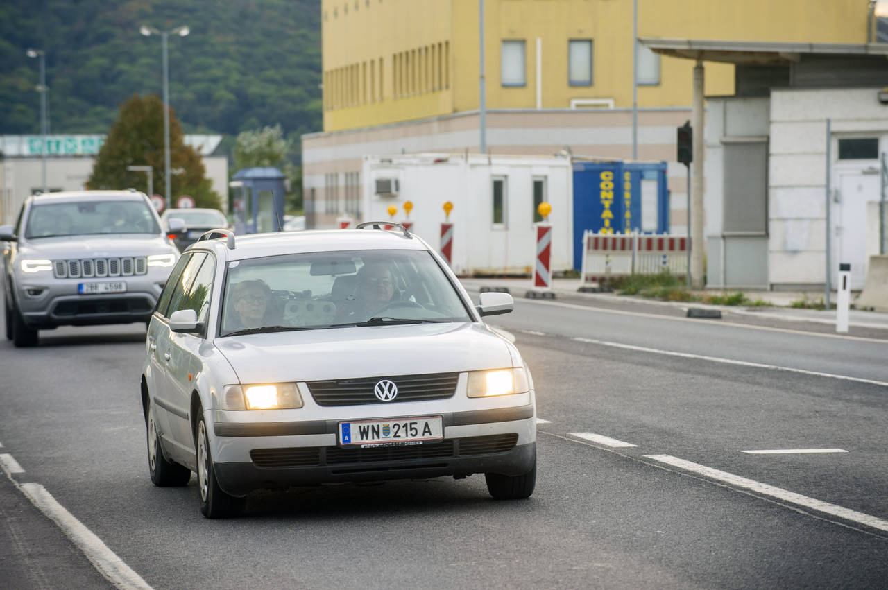 Cars make their way to the Austrian and Slovak border in Bratislava, Slovakia, Wednesday, Sept. 28,...