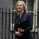 
              New British Prime Minister Liz Truss arrives to make an address outside Downing Street in London Tuesday, Sept. 6, 2022 after returning from Balmoral in Scotland where she was formally appointed by Britain's Queen Elizabeth II. (AP Photo/Kirsty Wigglesworth)
            