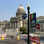 
              A Boise Pride Festival banner hangs on a lamp post in front of the Idaho Statehouse on Friday, Sept. 9, 2022, in Boise, Idaho. Organizers of the three-day festival starting Friday evening have been subjected to intense political pushback from the Idaho GOP and conservative groups in part because of a "Drag Kids" performance scheduled for Sunday. (AP Photo/Rebecca Boone)
            