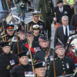 
              The procession with the coffin of Queen Elizabeth II, followed by, from left, King Charles III, Princess Anne, Prince Andrew, and Prince Edward, heads up the Royal Mile to St Giles' Cathedral in Edinburgh, Monday, Sept. 12, 2022. Britain's longest-reigning monarch who was a rock of stability across much of a turbulent century, died Thursday Sept. 8, 2022, after 70 years on the throne. She was 96. (AP Photo/Scott Heppell)
            