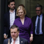 
              Liz Truss, centre, leaves the Conservative Central Office in Westminster after winning the Conservative Party leadership contest in London, Monday, Sept. 5, 2022. Liz Truss will become Britain's new Prime Minister after an audience with Britain's Queen Elizabeth II on Tuesday Sept. 6. (AP Photo/Alberto Pezzali)
            