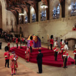 
              The King's Body Guard, formed of Gentlemen at Arms, Yeomen of the Guard and Scots Guards, change guard duties around the coffin of Queen Elizabeth II, Lying in State inside Westminster Hall, at the Palace of Westminster in London, Sunday, Sept. 18, 2022. (Adrian Dennis/Pool Photo via AP)
            